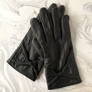 ALDO black leather gloves with bow